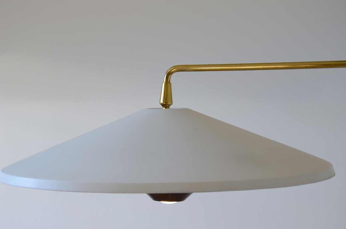 Giuseppe Ostuni Rare wall lamp adjustable in all positions with extendable arm. Oluce 1950