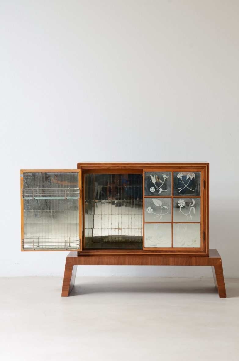 Small wooden bar cabinet with engraved and ground mirror.