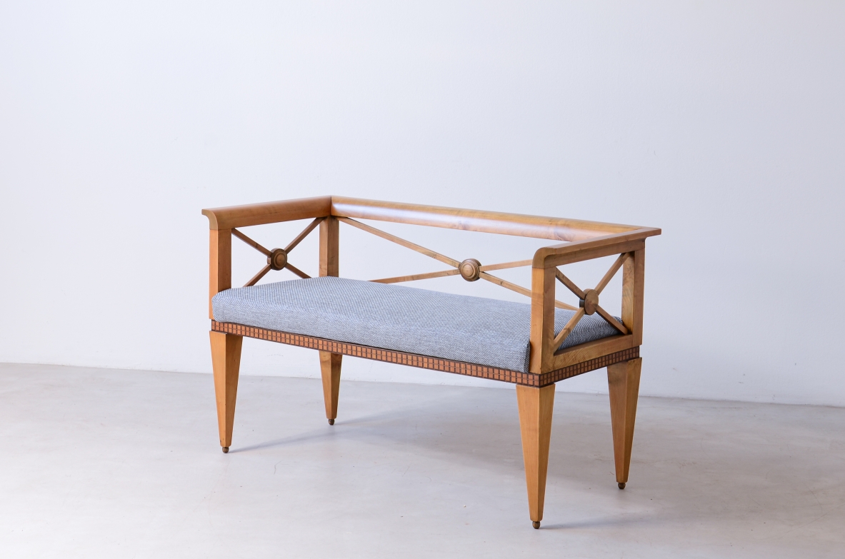 Ulisse Stacchini Entrance bench in light wood with cross motif on the back. 1930's