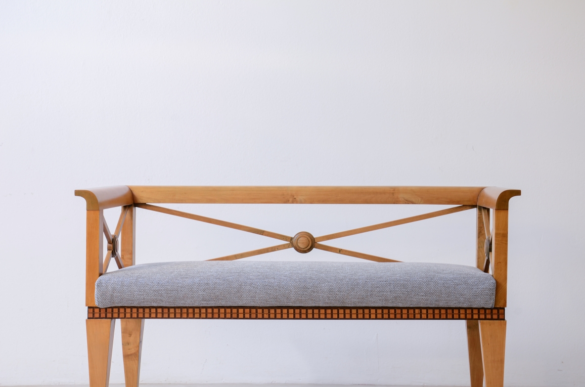 Ulisse Stacchini Entrance bench in light wood with cross motif on the back. 1930's