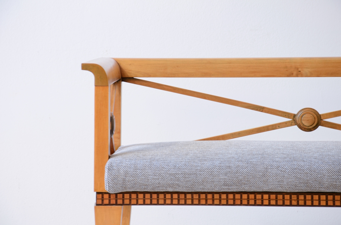 Ulisse Stacchini Entrance bench in light wood with cross motif on the back. 1930's