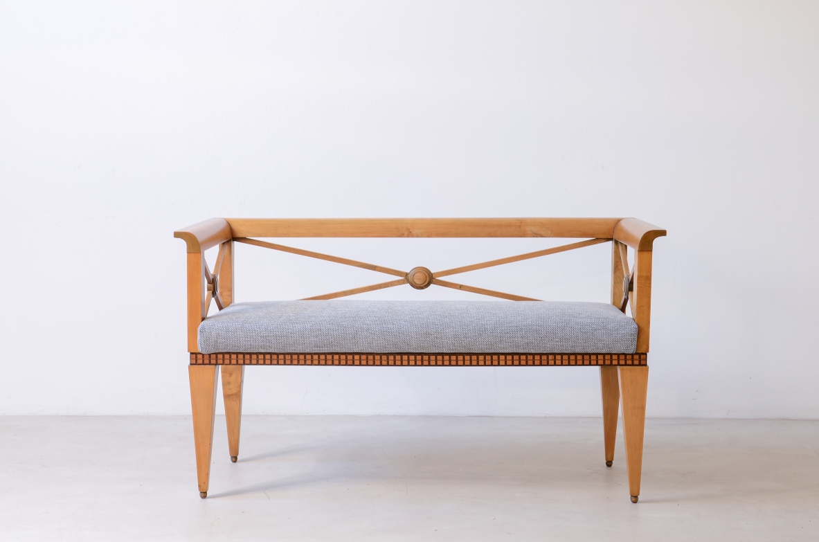 Ulisse Stacchini Entrance bench in light wood with cross motif on the back. 1930's