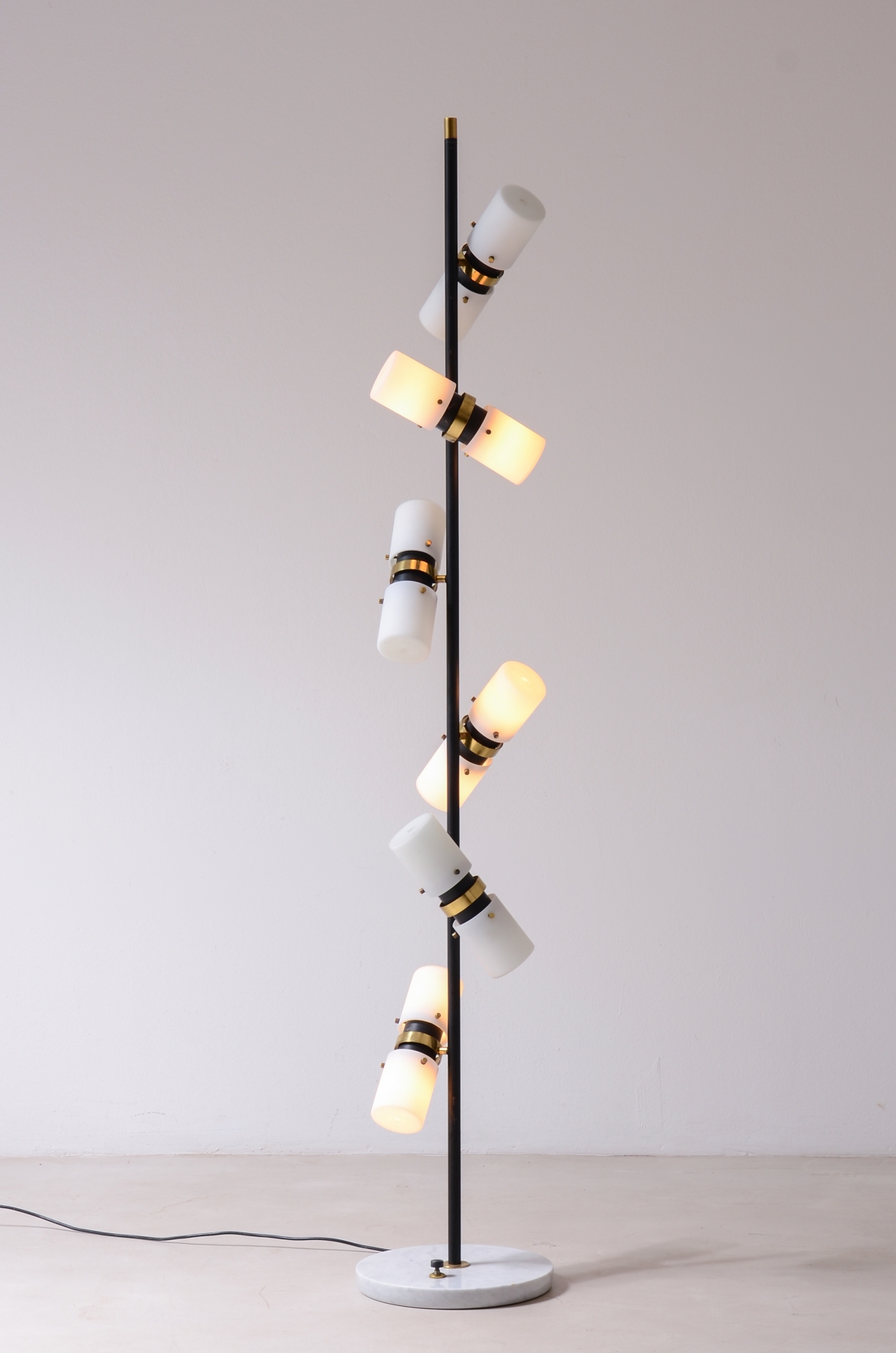 Angelo Brotto. Rare 12-light floor lamp with metal stem,  brass with opaline glass