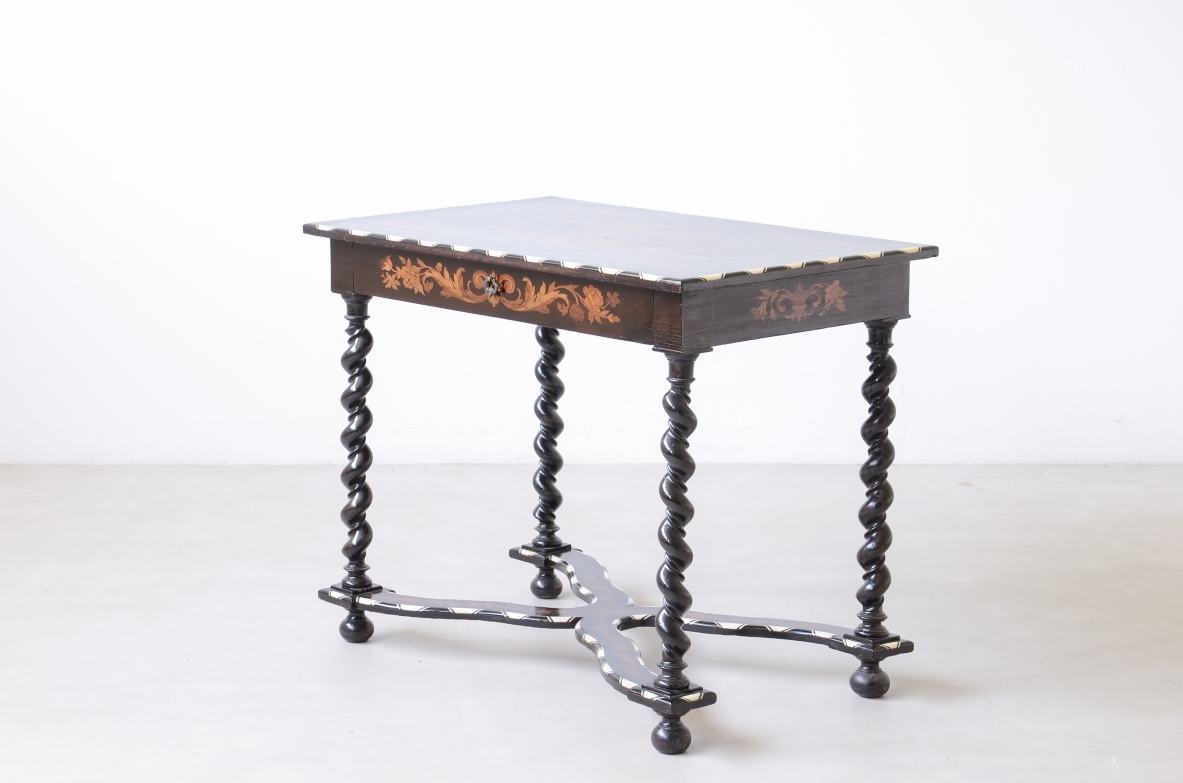 table finely inlaid in various woods and profiled in ivory 1850