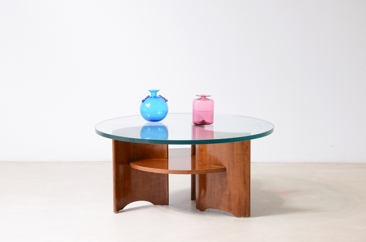 Elegant coffee table with base made up of 3 curved wooden supports 1960's