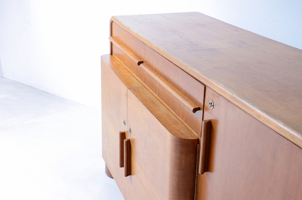 Cabinet with doors and drawers in blond wood. Art Deco period, ca. 1930.