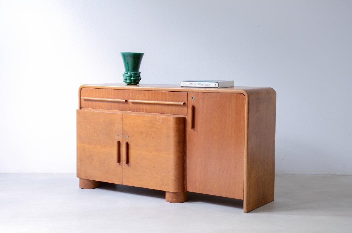 Cabinet with doors and drawers in blond wood. Art Deco period, ca. 1930.