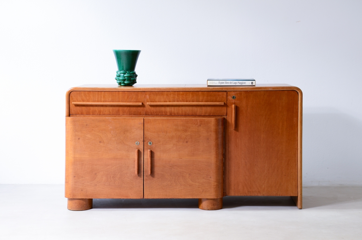 Cabinet with doors and drawers in blond wood. Art Deco period, ca. 1930.