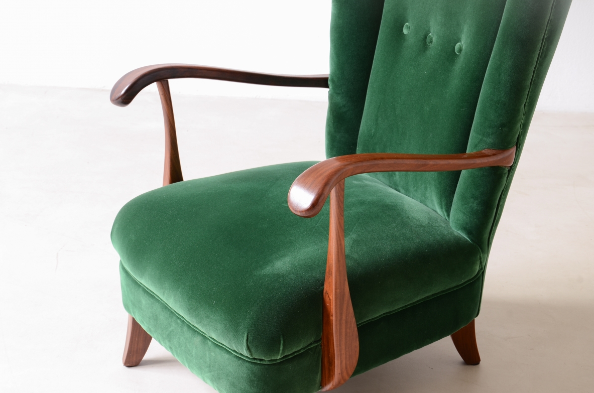 Lio Carminati Elegant armchair in shaped wood and padded fabric 1940's