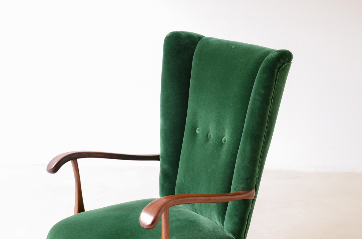 Lio Carminati Elegant armchair in shaped wood and padded fabric 1940's