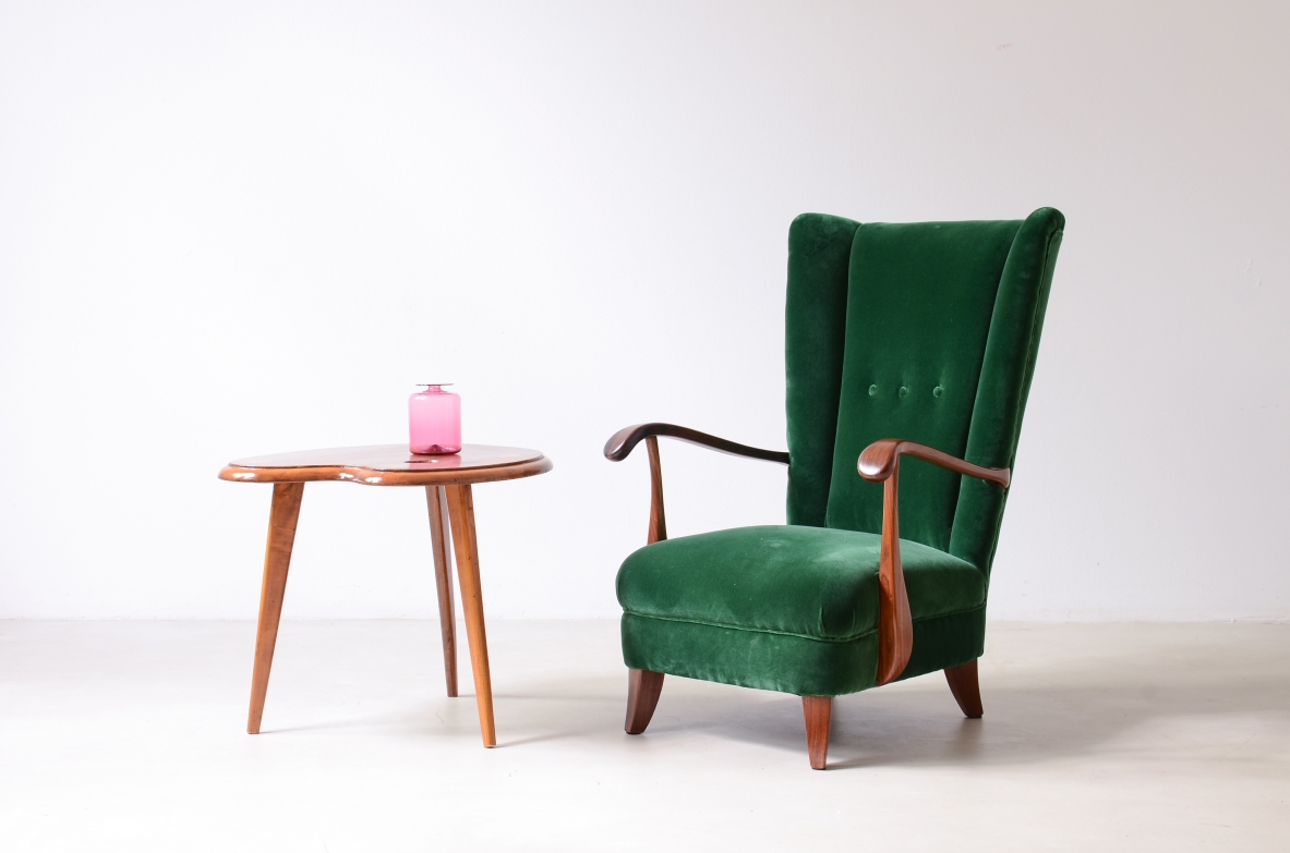 Lio Carminati Elegant armchair in shaped wood and padded fabric 1940's