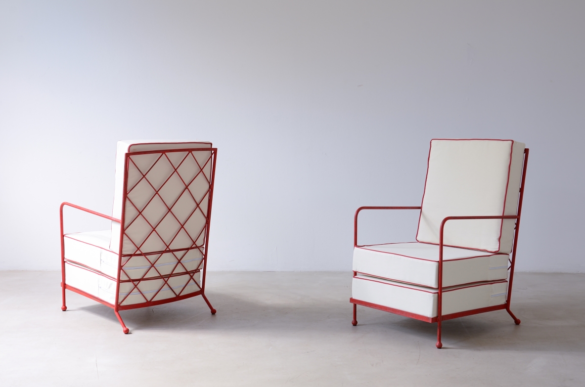 Pair of iron and iron rod armchairs  handcrafted from a design by Jean Royere.