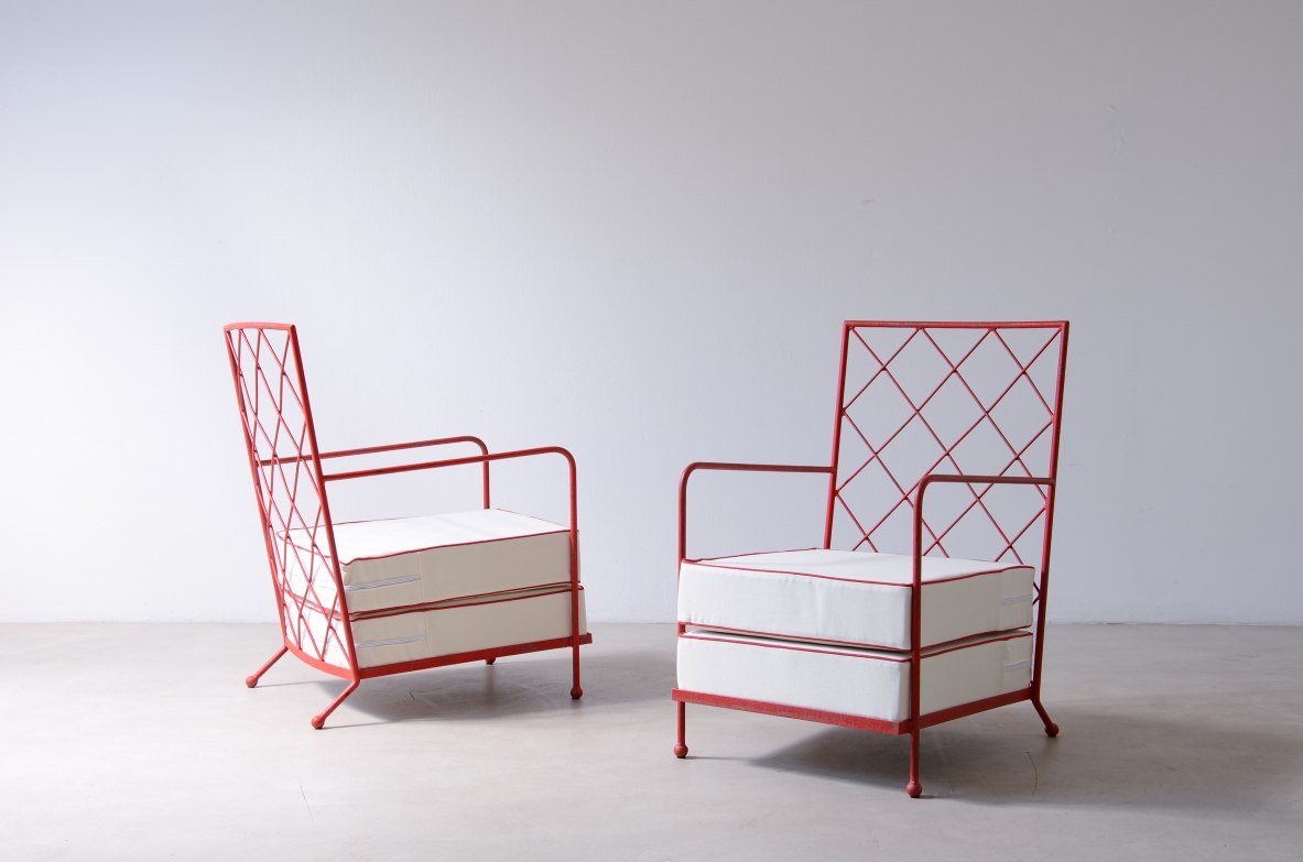 Pair of iron and iron rod armchairs  handcrafted from a design by Jean Royere.