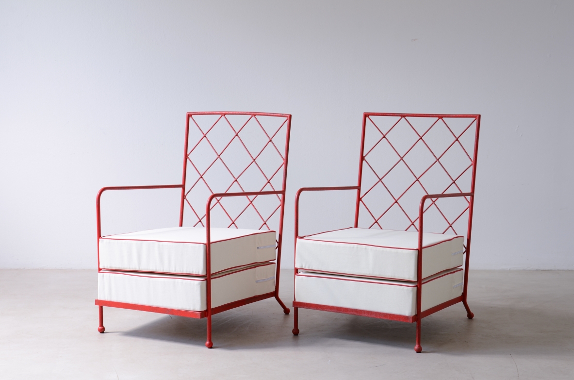 Pair of iron and iron rod armchairs  handcrafted from a design by Jean Royere.