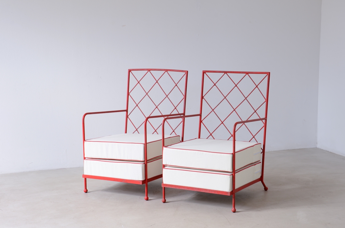Pair of iron and iron rod armchairs  handcrafted from a design by Jean Royere.