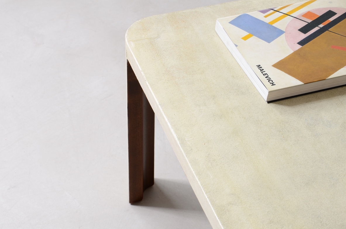 Elegant parchment-covered wooden coffee table, Italian manufacture, circa 1940.