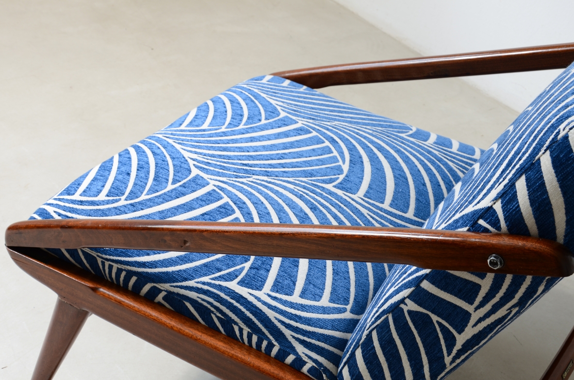 pair of wooden reclining armchairs, Made by ISA Bergamo in 1954.