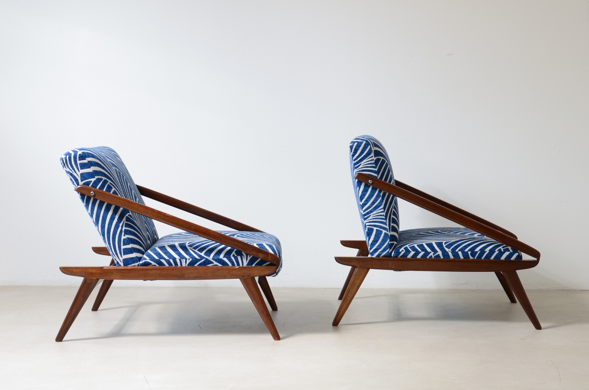pair of wooden reclining armchairs, Made by ISA Bergamo in 1954.