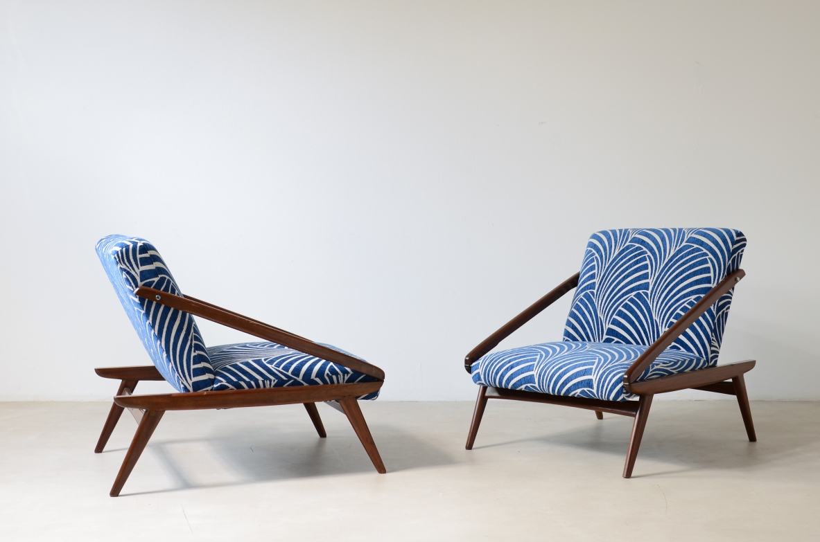 pair of wooden reclining armchairs, Made by ISA Bergamo in 1954.
