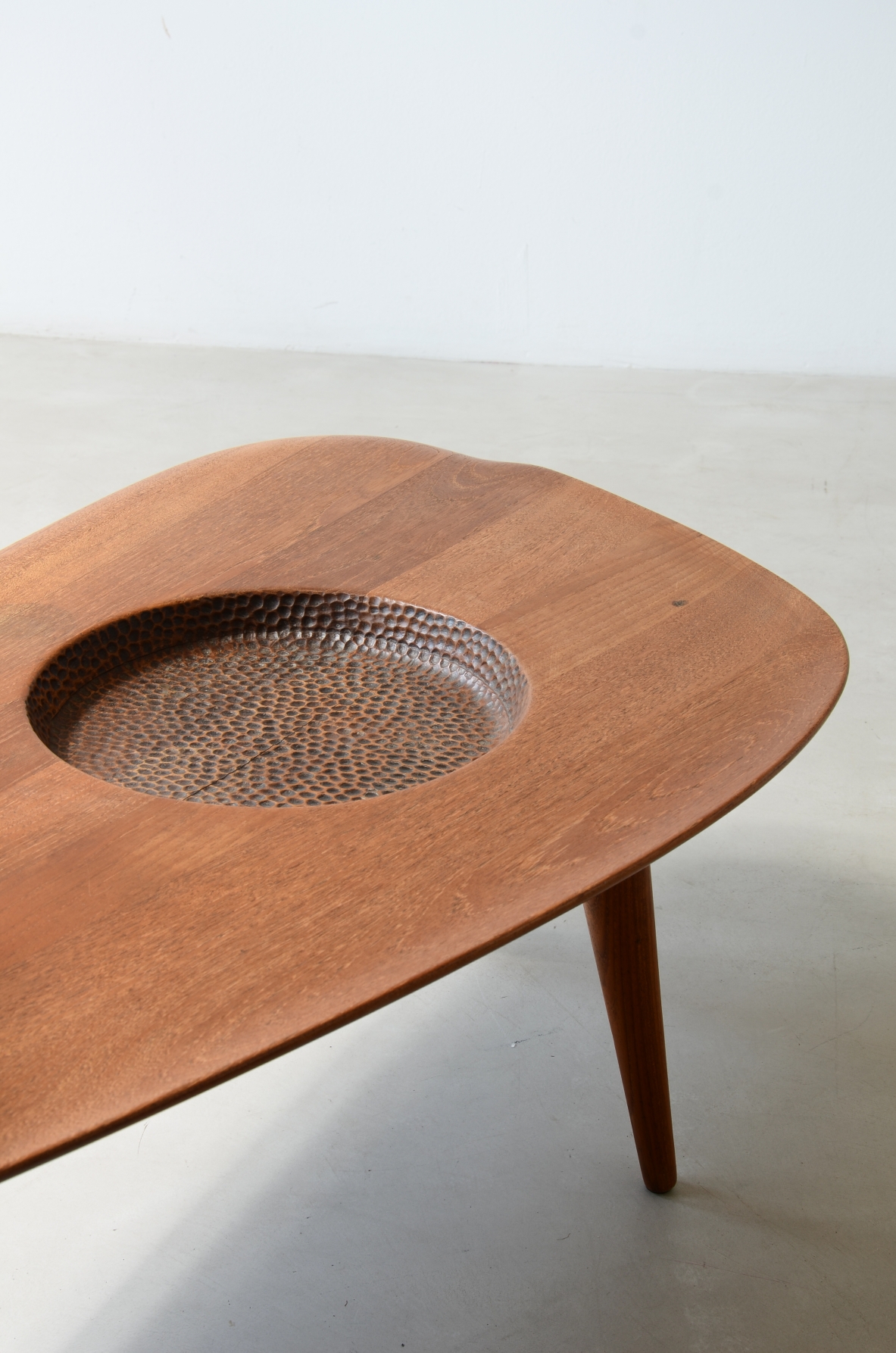 1950's  large coffee table with an organically shaped solid wood top