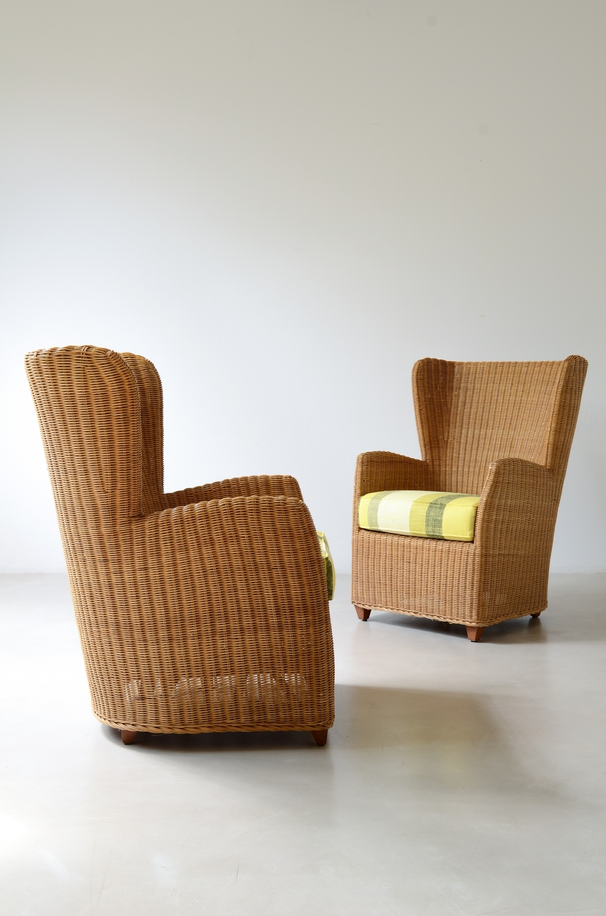 Two large woven rattan armchairs. Italian manufacture, circa 1960.