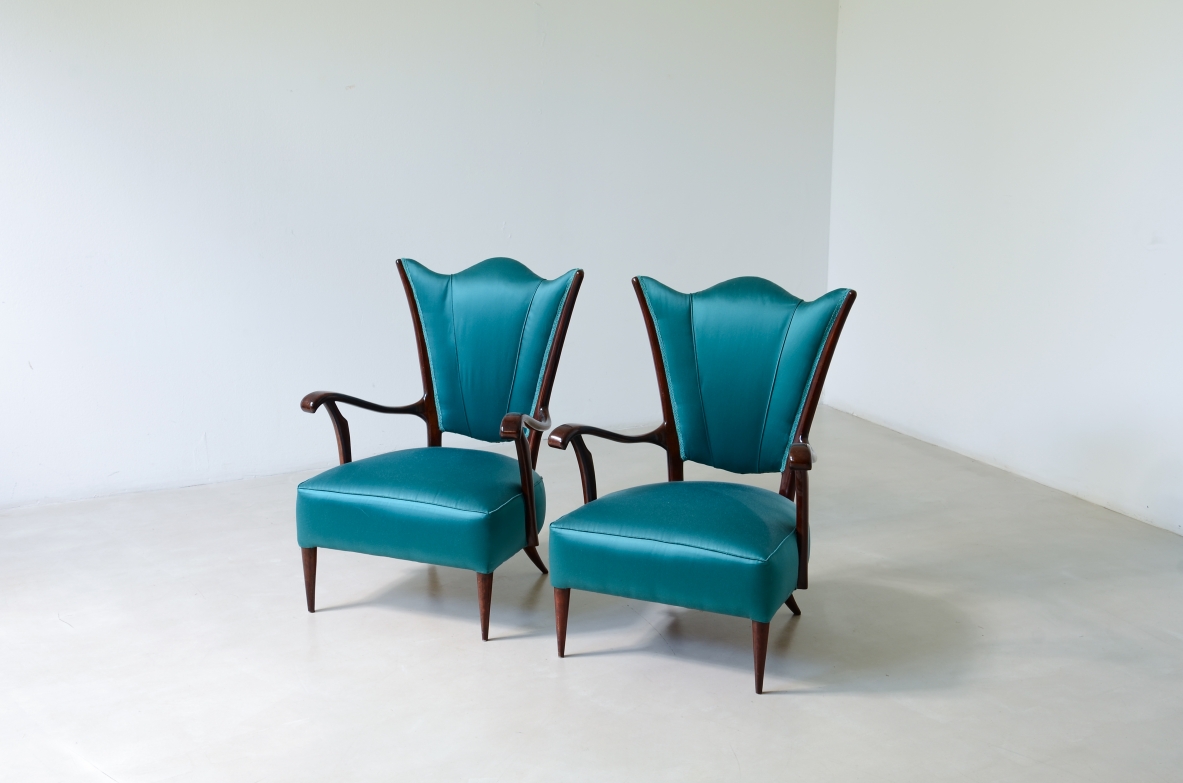 Pair of armchairs with an iron frame and woven rubber and rattan thread.Saporiti Italia, ca. 1950.