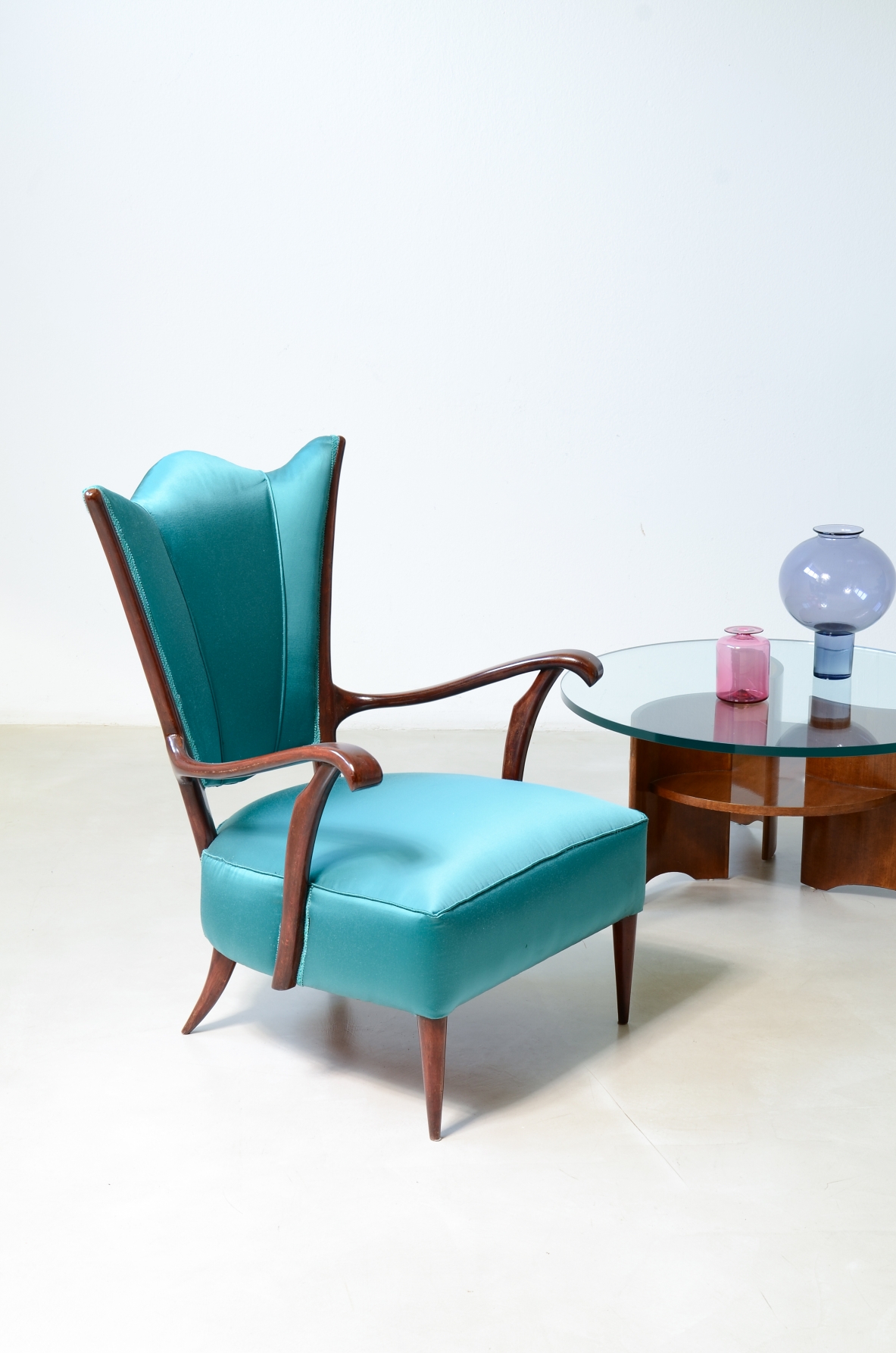 Pair of armchairs with an iron frame and woven rubber and rattan thread.Saporiti Italia, ca. 1950.