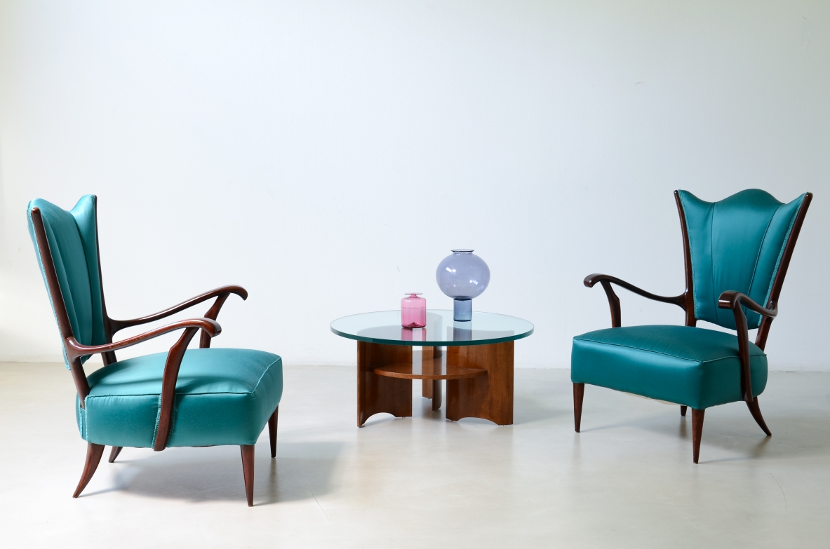 Pair of armchairs with an iron frame and woven rubber and rattan thread.Saporiti Italia, ca. 1950.