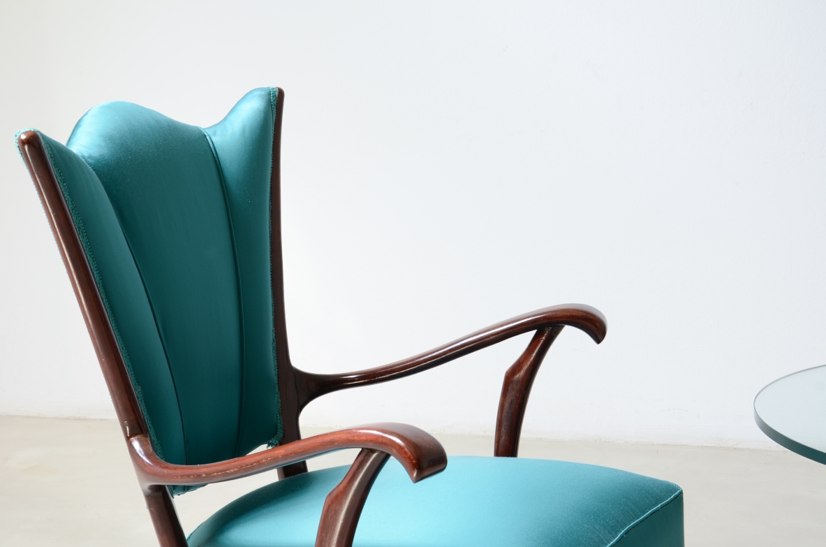 Pair of armchairs with an iron frame and woven rubber and rattan thread.Saporiti Italia, ca. 1950.