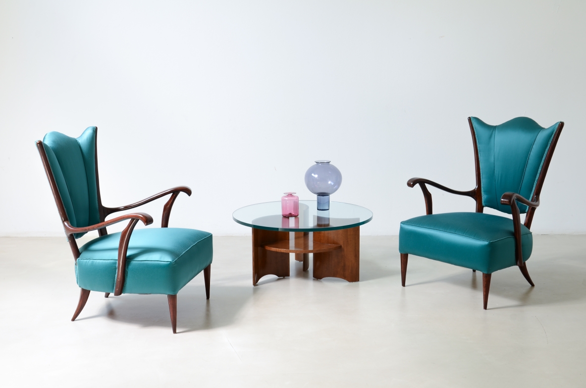 Pair of armchairs with an iron frame and woven rubber and rattan thread.Saporiti Italia, ca. 1950.