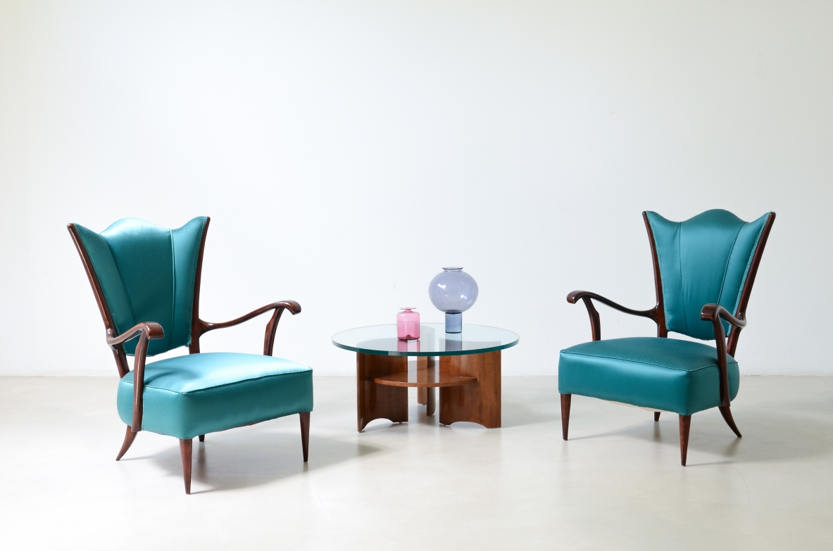 Pair of armchairs with an iron frame and woven rubber and rattan thread.Saporiti Italia, ca. 1950.