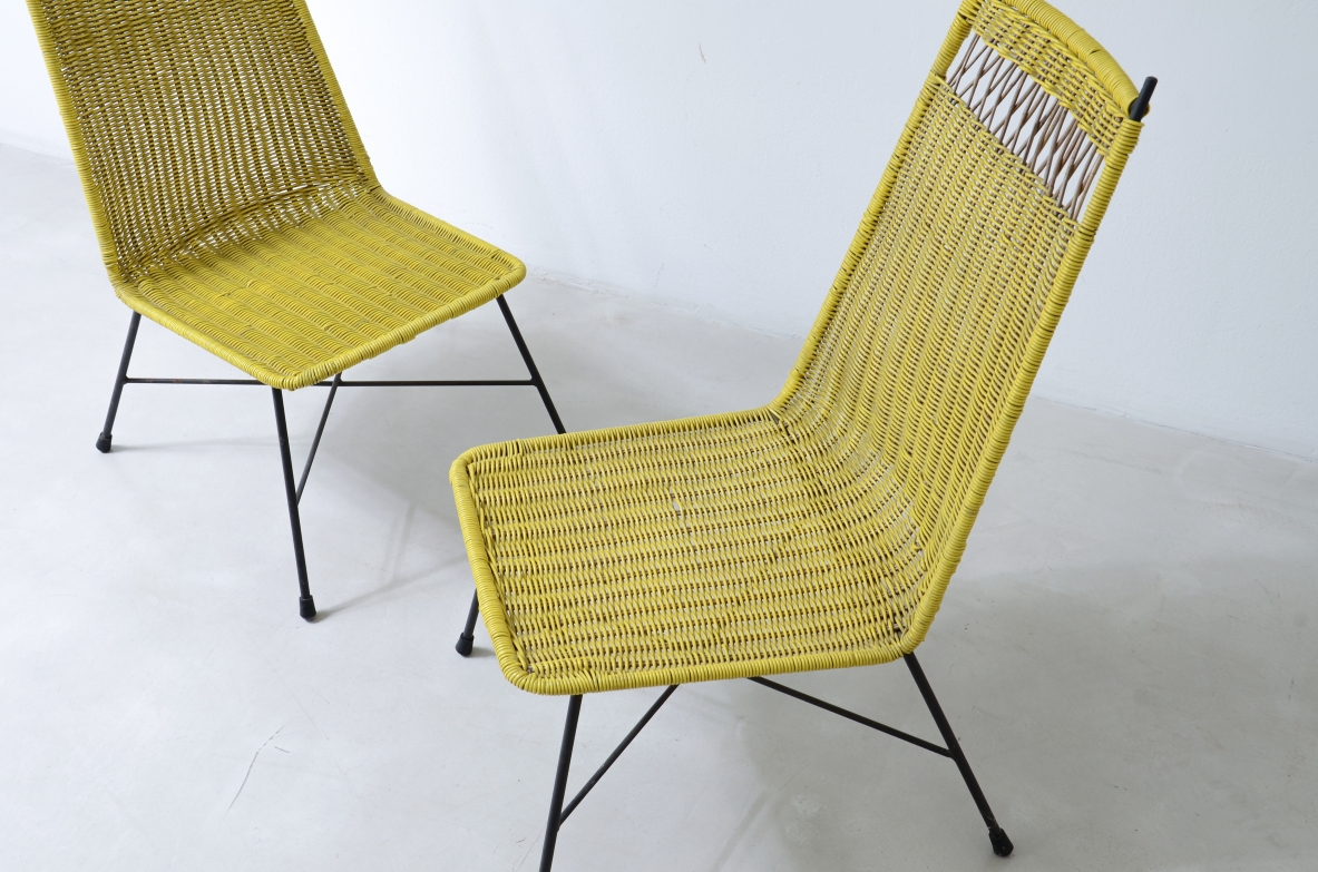 Pair of armchairs with an iron frame and woven rubber and rattan thread.Saporiti Italia, ca. 1950.