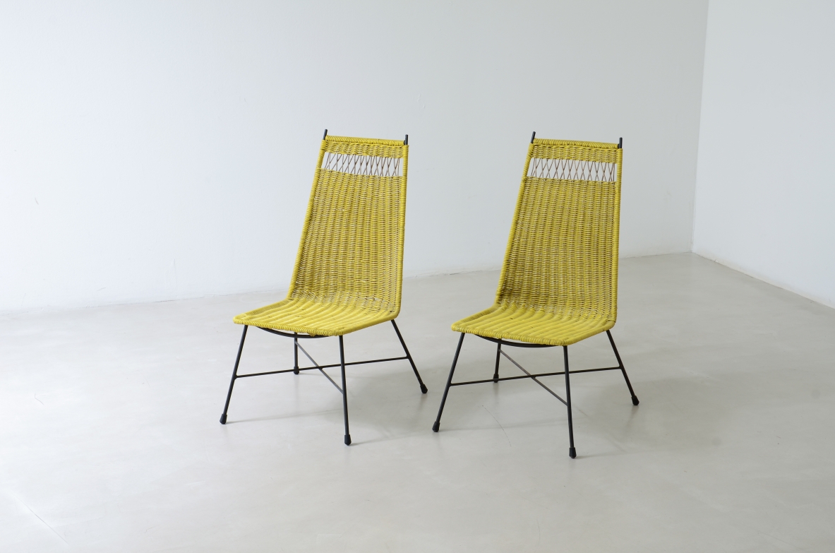 Pair of armchairs with an iron frame and woven rubber and rattan thread.Saporiti Italia, ca. 1950.