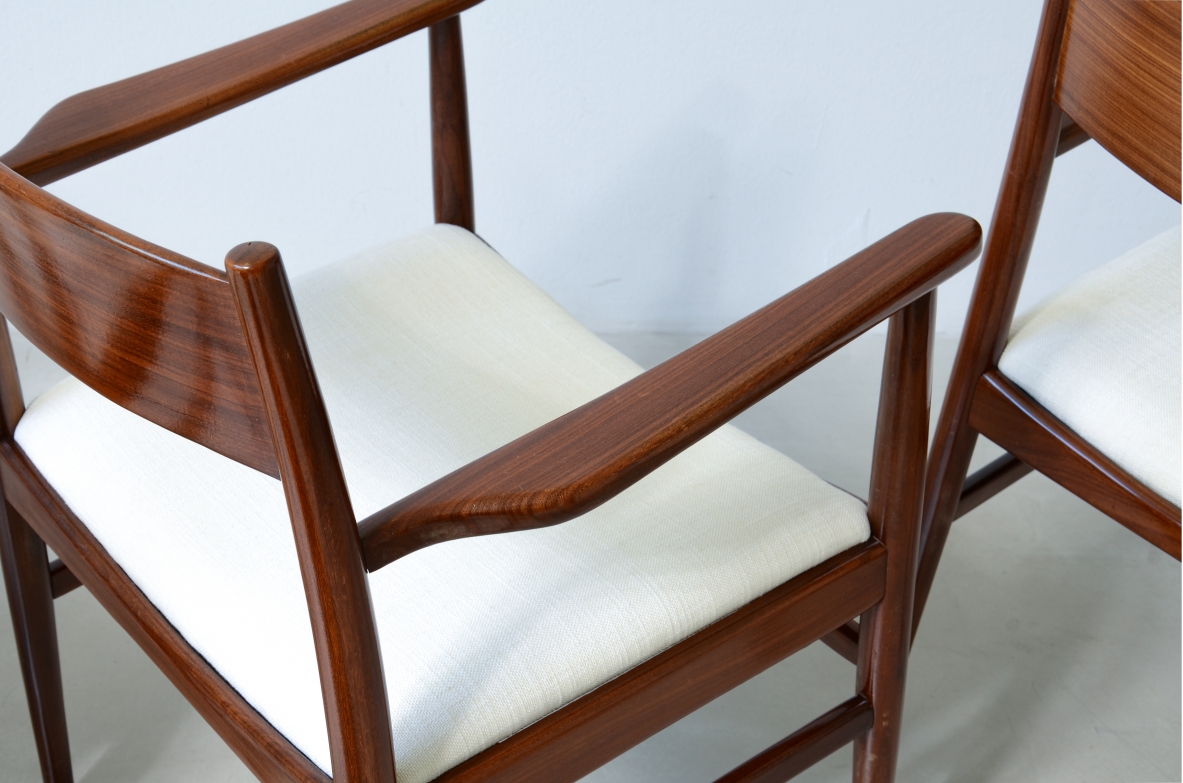 Rare set of 8 armchairs in shaped teak. Manufacture L. Jacobsen, ca. 1960.