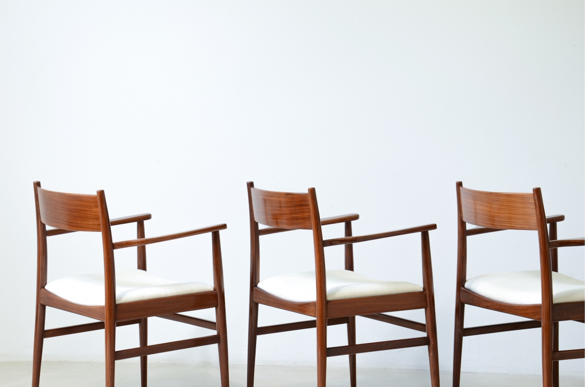 Rare set of 8 armchairs in shaped teak. Manufacture L. Jacobsen, ca. 1960.