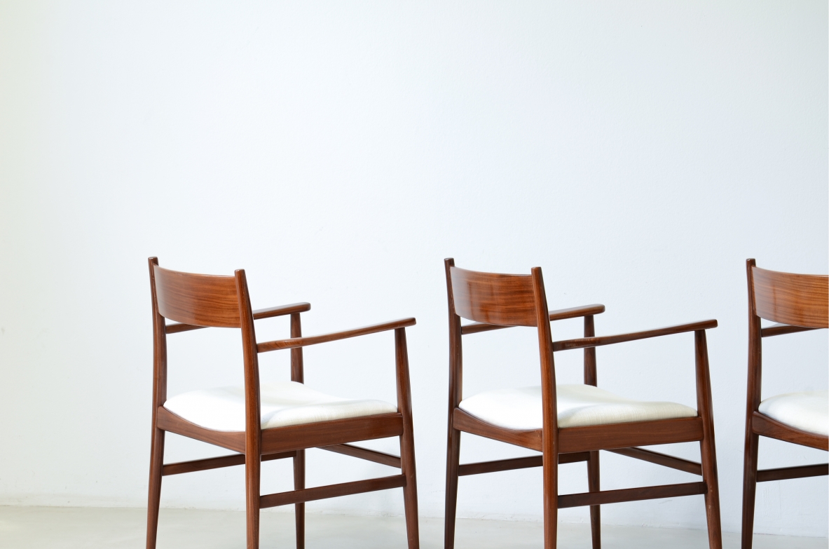 Rare set of 8 armchairs in shaped teak. Manufacture L. Jacobsen, ca. 1960.