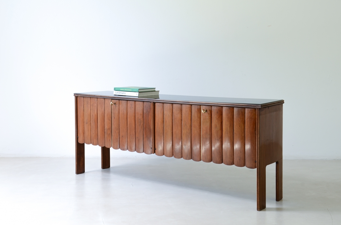 Guglielmo Ulrich. Rare four-door walnut cabinet with a wave motif. Arca manufacture, 1940s.