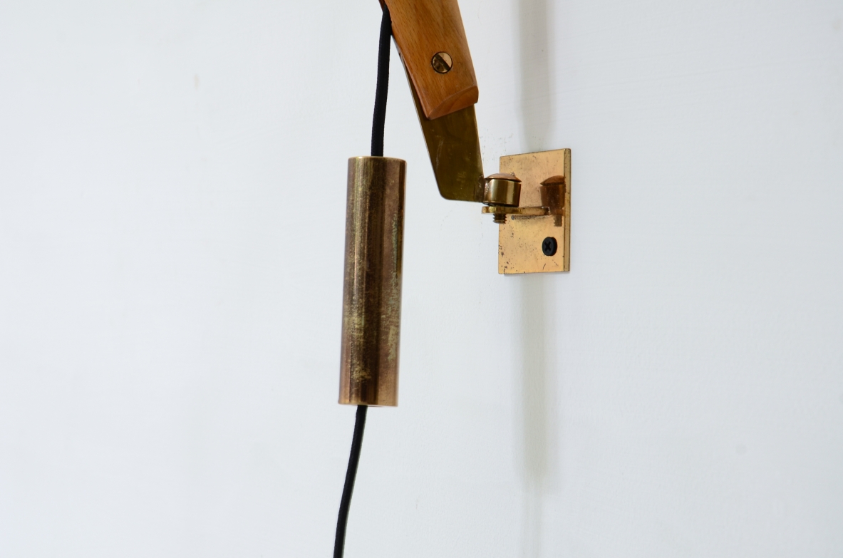 Franco Buzzi, wall lamp with extendable brass arm. Stilnovo 1950's