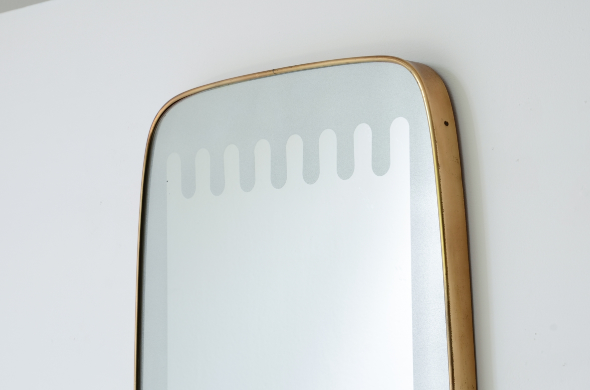 Pietro Chiesa  Elegant shaped mirror with a refined satin wave finish. Fontana Arte manufacture, ca.1950.