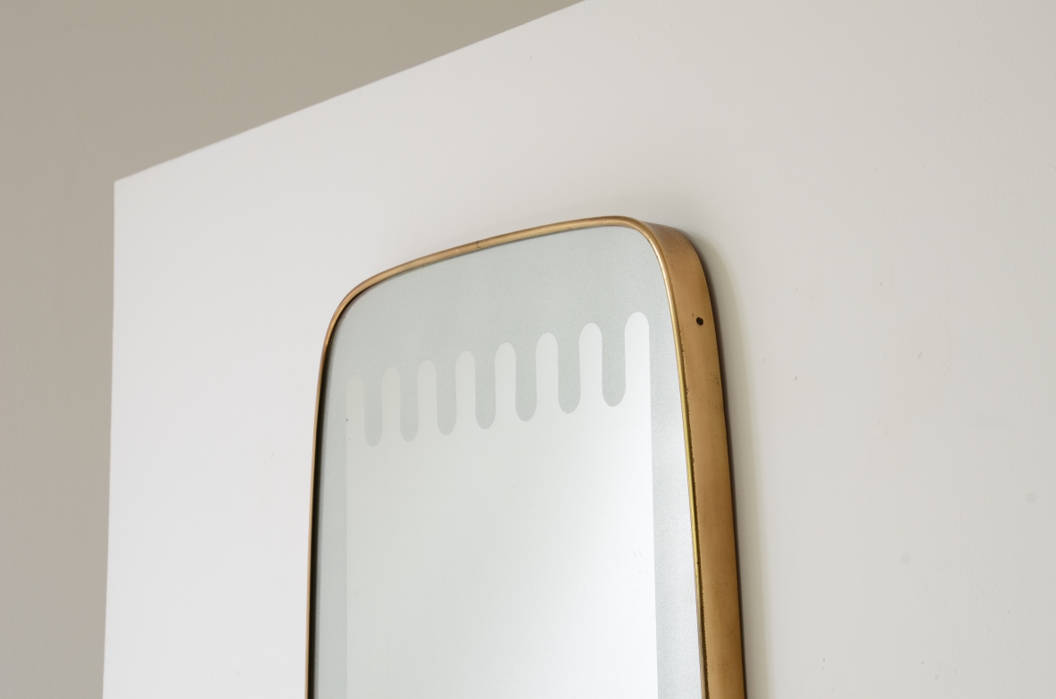Pietro Chiesa  Elegant shaped mirror with a refined satin wave finish. Fontana Arte manufacture, ca.1950.