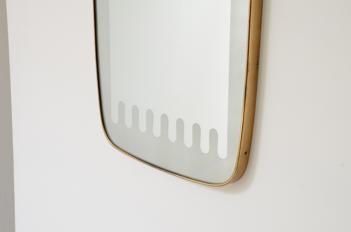 Pietro Chiesa  Elegant shaped mirror with a refined satin wave finish. Fontana Arte manufacture, ca.1950.