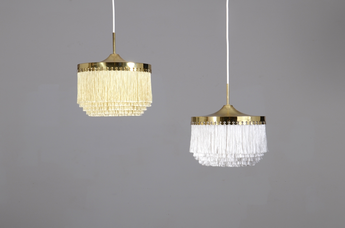 Hans Agne Jakobsson, Ceiling lamp Model T604 produced by Hans Agne Jakobsson AB.  Polished brass structure and white silk fringe Sweden, 1965/1966