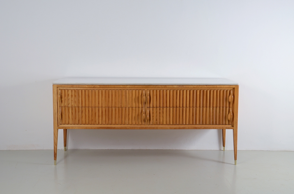 Unique chest of drawers in maple wood with grinded front drawers, very nice handles and fine-grained marble top. Prod. Cassina, 1957.