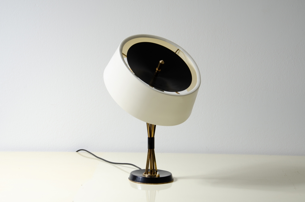 Giuseppe Ostuni, metal and brass table lamp with adjustable shade in all directions.  Oluce 1950s.
