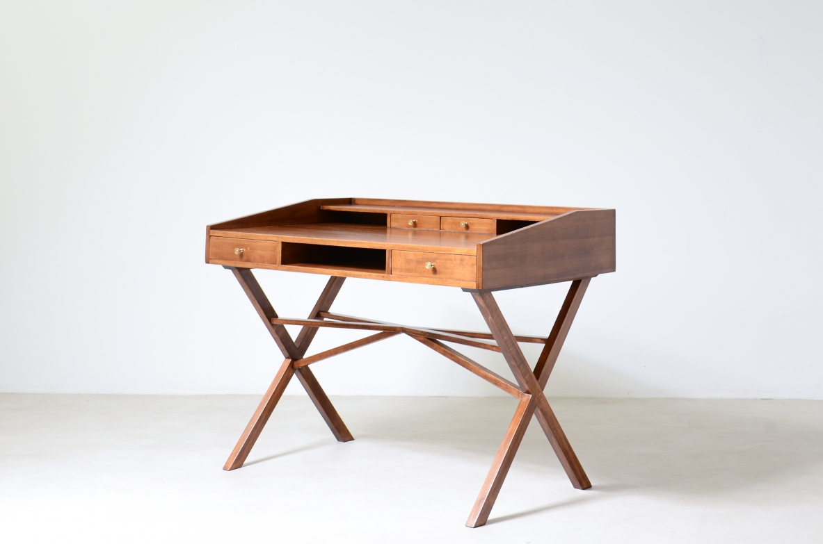 Center desk in walnut with beautiful cross on the base and little houses on the top.  Italian manufacture, 1960's