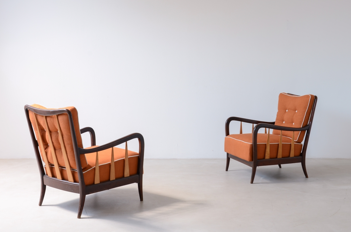 Paolo Buffa  Pair of armchairs in shaped and turned wood with seat and back in padded fabric.1940's
